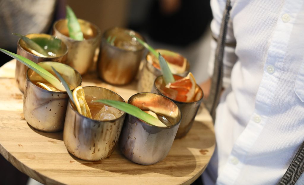 wooden tray of cocktails