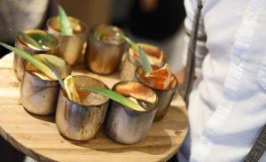 wooden tray of cocktails