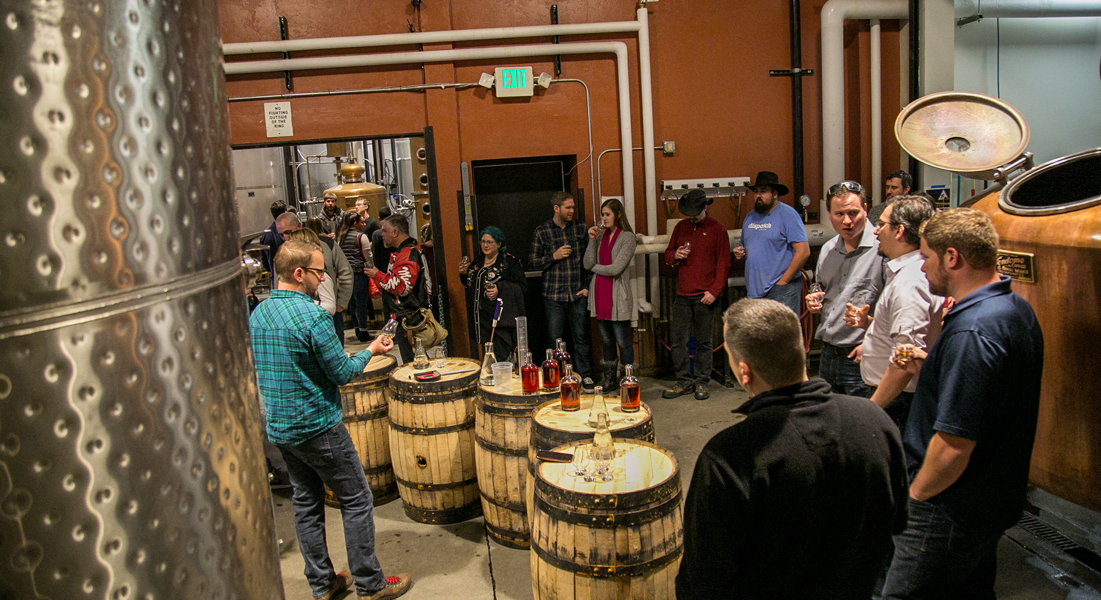 people on distillery tour